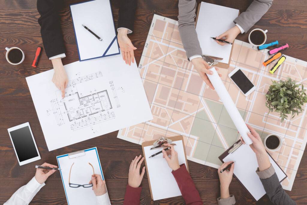 workers of real estate agency pnlks22 scaled-Lugano-venta-de-departamentos